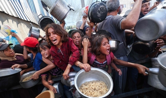 <strong>가자지구의 처절한 식량 배급 현장 /</strong>AFP=연합뉴스